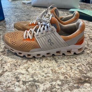 On Running Sneakers in Orange and Beige